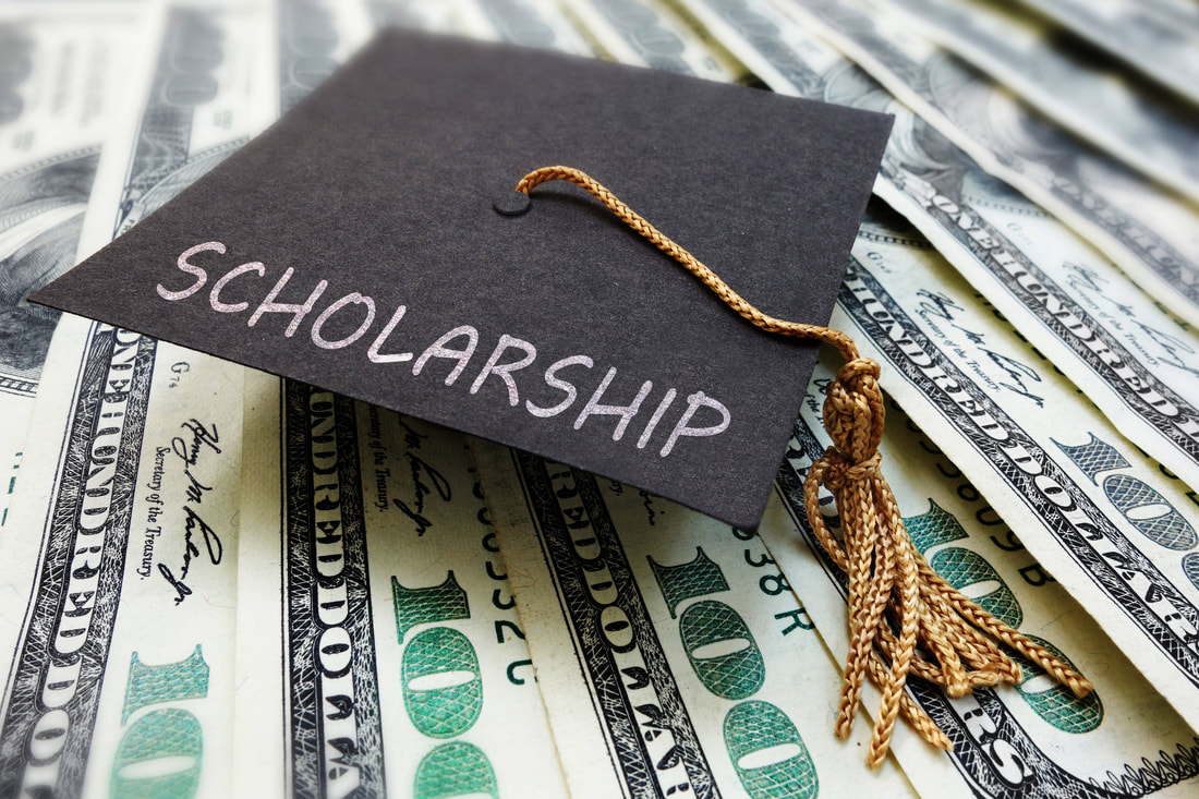 scholarship-cap-on-money-105209321_orig